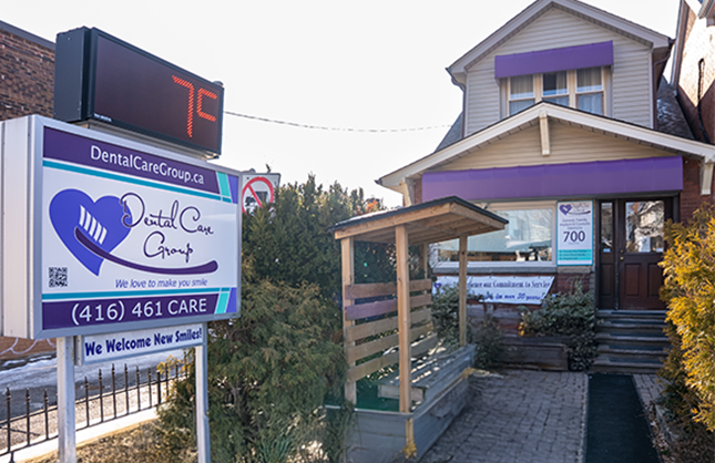 Exterior view of the Dental Care Group clinic building.